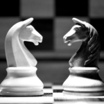 two chess knights facing each other on a chess board - benefits of mediation