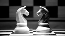 two chess knights facing each other on a chess board - benefits of mediation