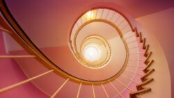 looking up through a spiral staircase - Spousal and Child Support Payments After Death