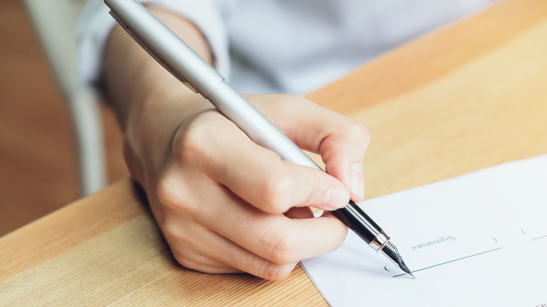 Signing - what is a separation agreement in Ontario - with insights from Kelly Jordan Family Law. 