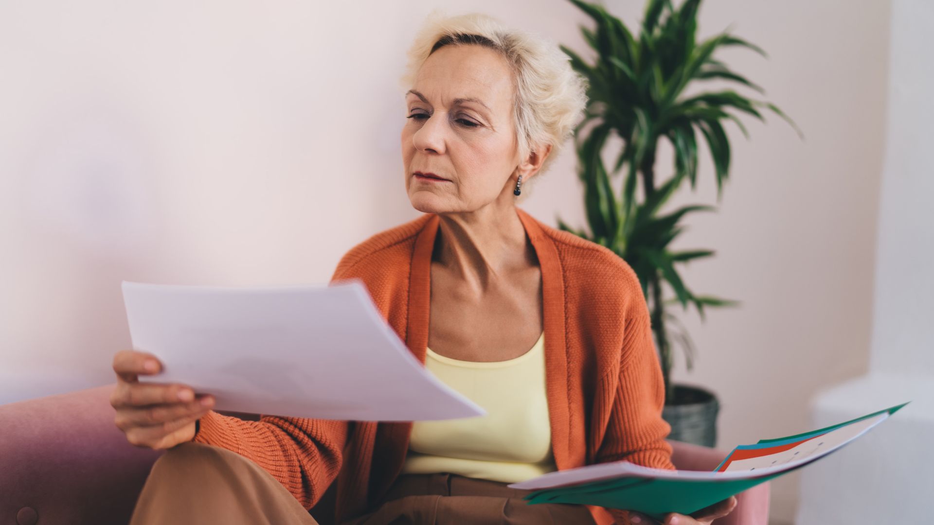 Woman looking at documents - insights into the divorce process in Ontario from Kelly Jordan Family Law.