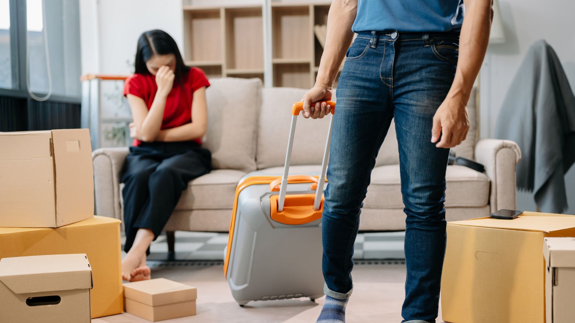 Faceless man packing - divorce process in Ontario guide from Kelly Jordan Family Law.
