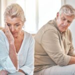 Unhappy older couple on a sofa - grey divorce in Canada - Kelly D Jordan Family Law.