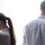 Couple with their backs turned to each other - grounds for divorce in Ontario - Kelly Jordan Family Law.