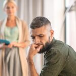 Man looking down - adultery in Canada insights with Kelly Jordan Family Law.