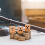 Gavel and the word tax - are legal fees a tax deduction- Kelly Jordan Family Law.
